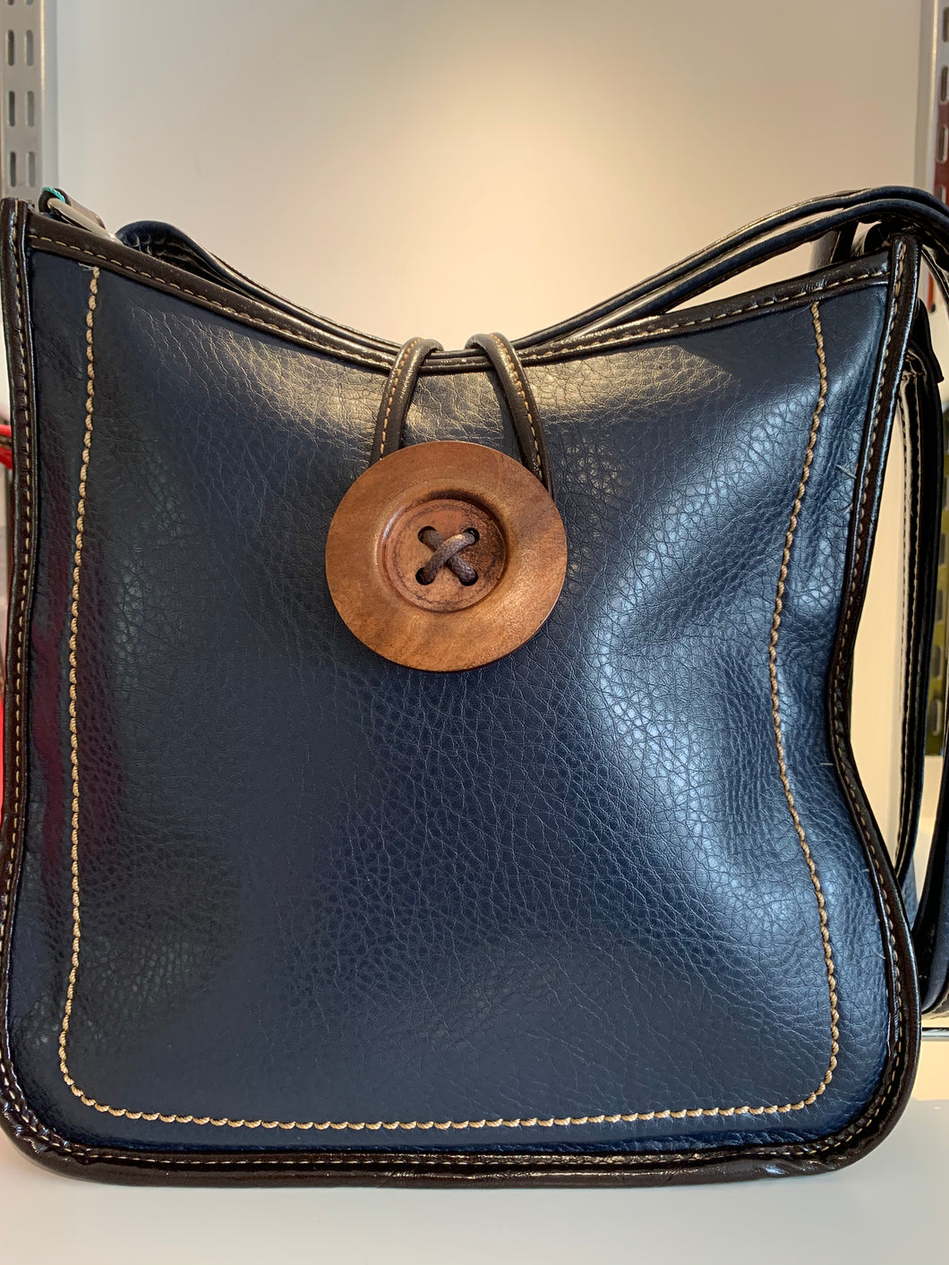 BUTTON CROSSBODY BAG